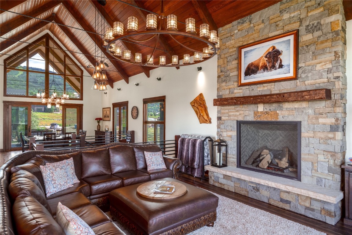 2669 Bronc Buster Loop Steamboat Springs, CO 80487 - Photo 11 of 49 a living room with furniture and a fireplace