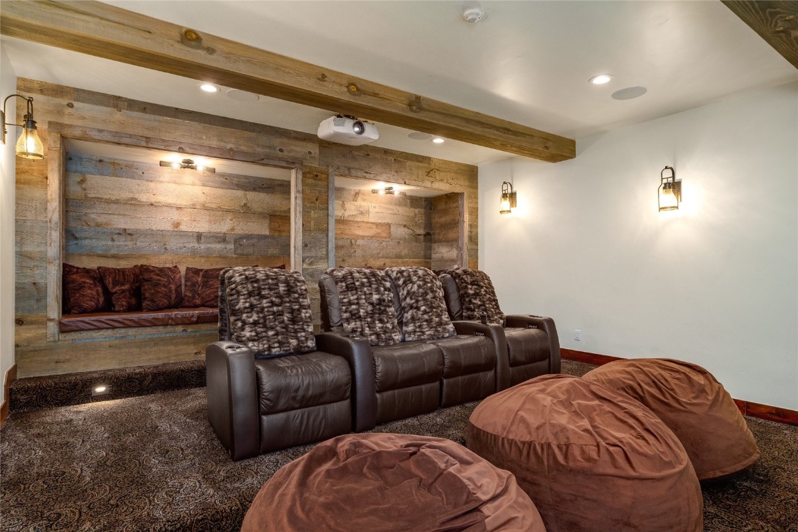 2669 Bronc Buster Loop Steamboat Springs, CO 80487 - Photo 40 of 49 a living room with furniture and a glass door