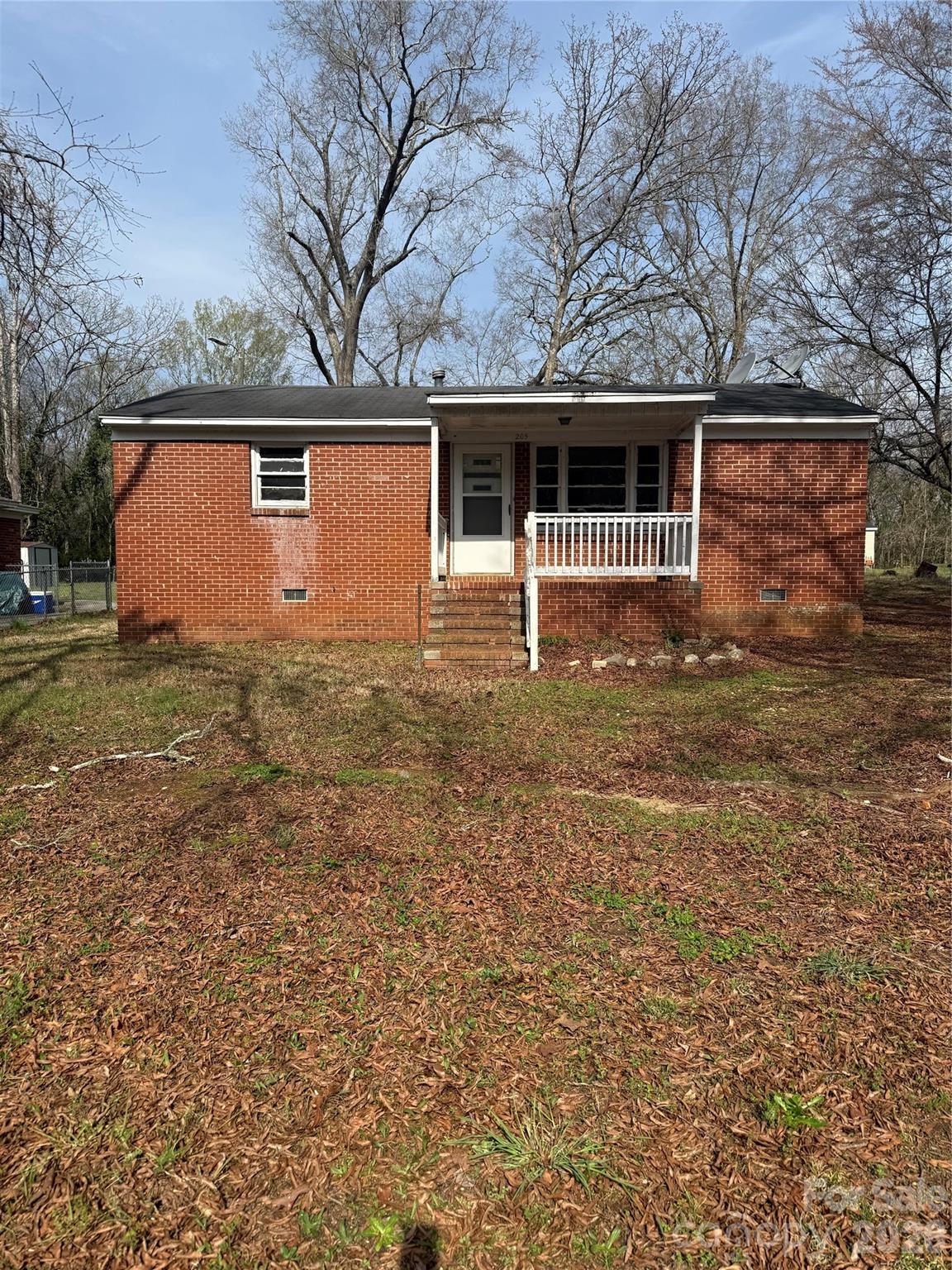 205 Jewel Street Chester, SC 29706 - Photo 1 of 20 a front view of a house with a yard