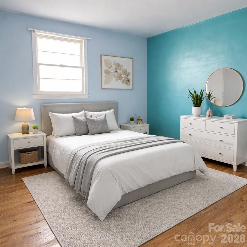 205 Jewel Street Chester, SC 29706 - Photo 14 of 20 a bedroom with a bed and window