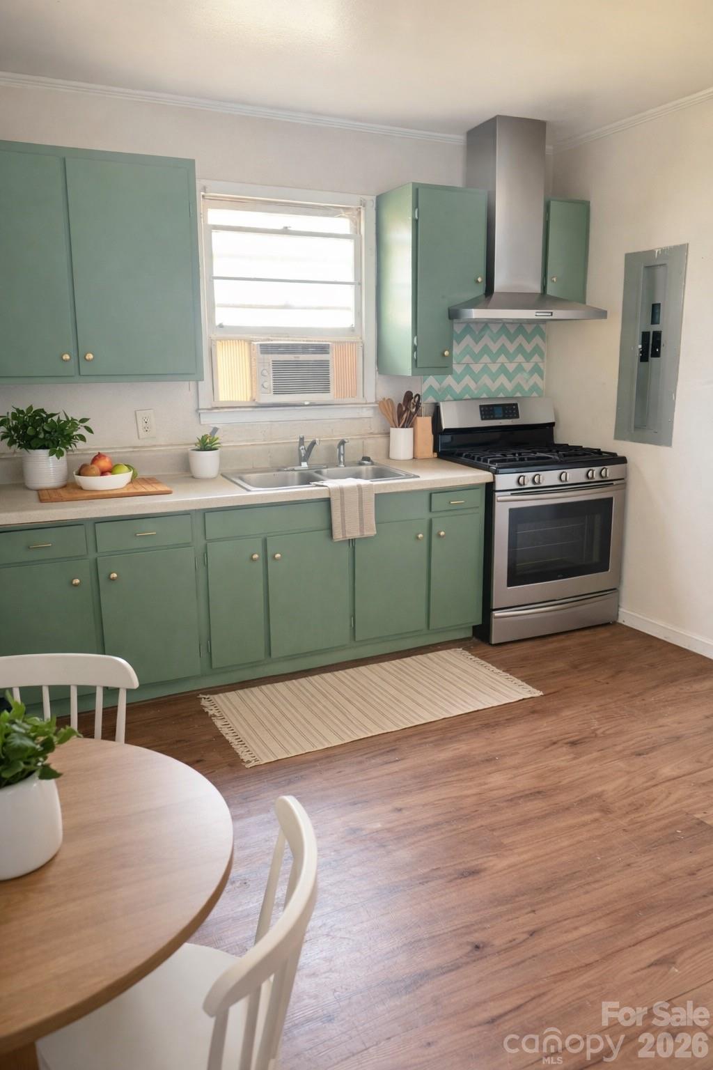 205 Jewel Street Chester, SC 29706 - Photo 6 of 20 a kitchen with a table and chairs