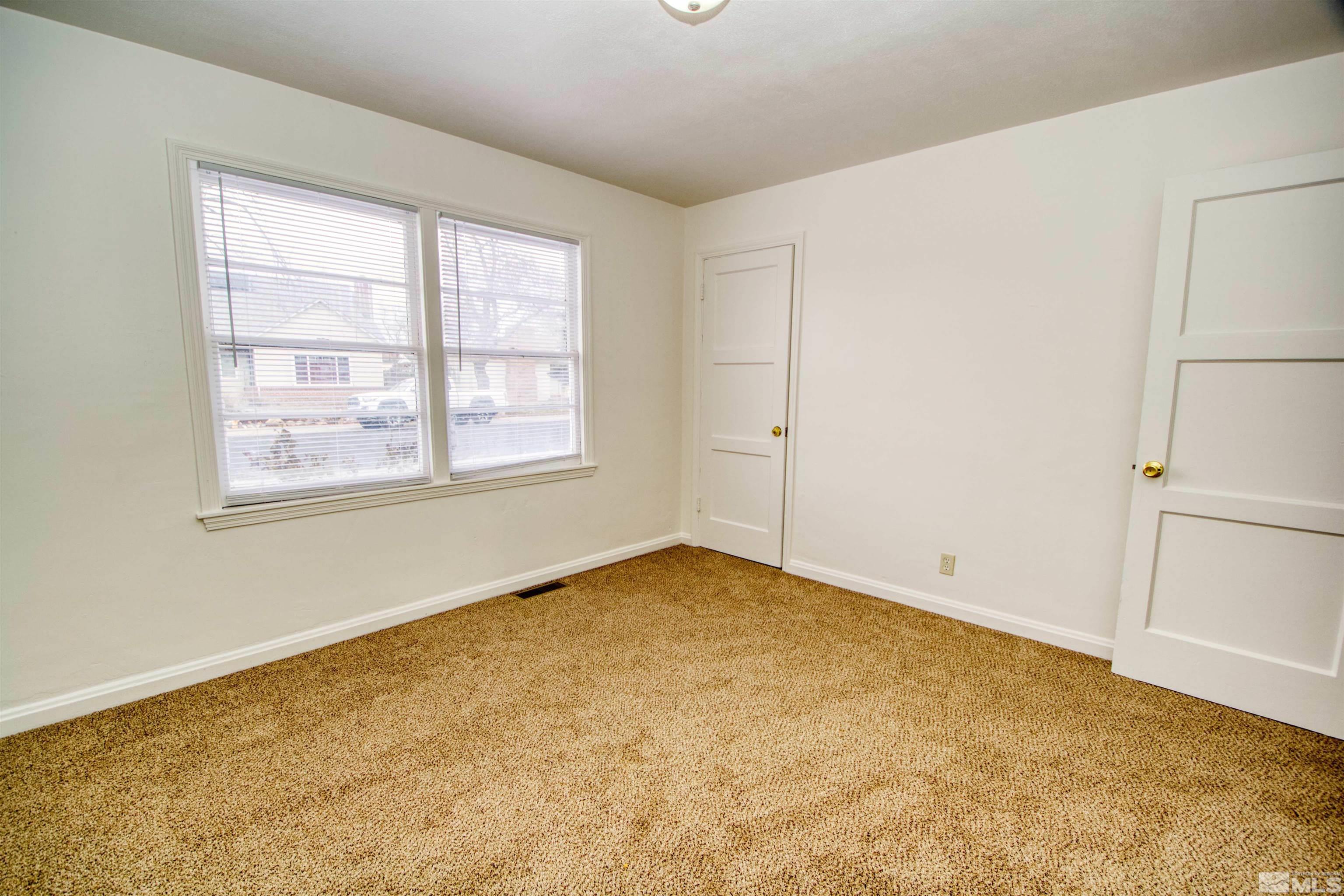 345 H Street Sparks, NV 89431 - Photo 11 of 17 an empty room with a window