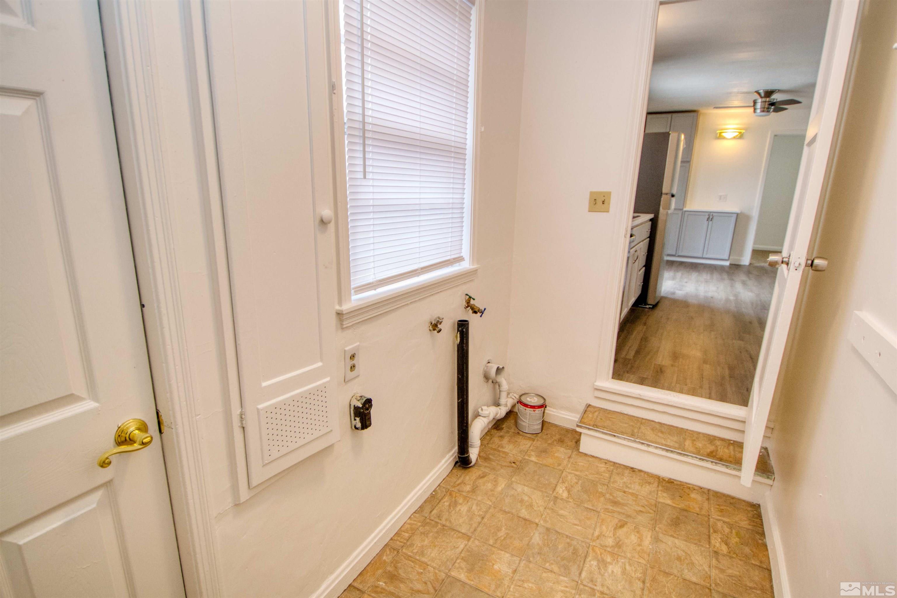 345 H Street Sparks, NV 89431 - Photo 8 of 17 a bathroom with a tub and a window