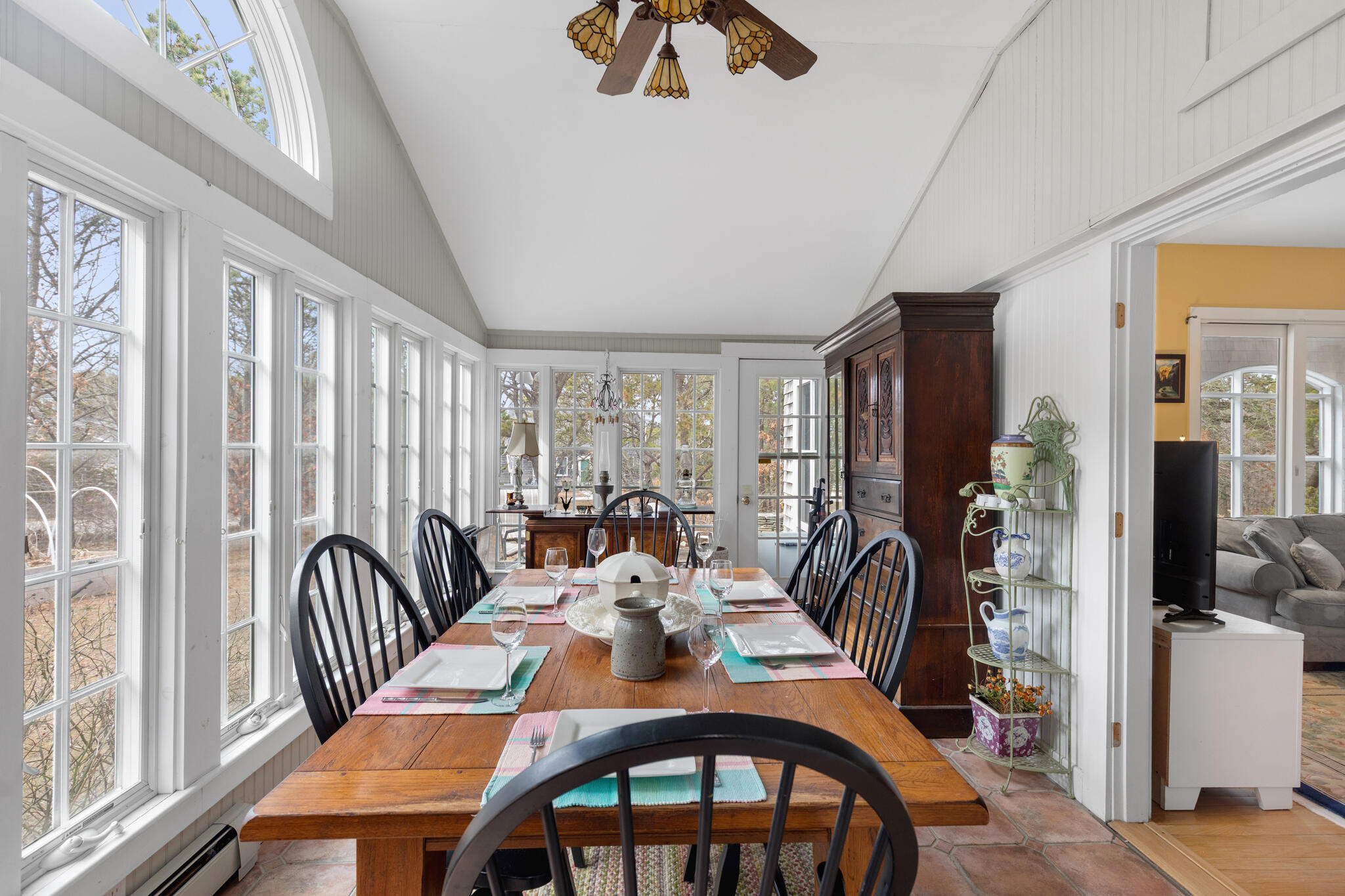 311 South Sunken Meadow Road Eastham, MA 02642 - Photo 20 of 57 a view of a dining room with furniture window and outside view