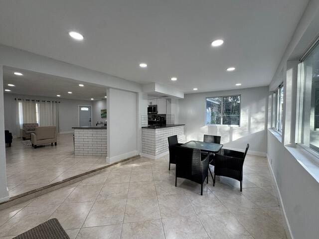 1632 Northwest 5th Street Boca Raton, FL 33486 - Photo 8 of 22 a view of a dining room with furniture