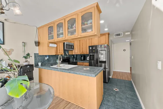 a view of living room and kitchen