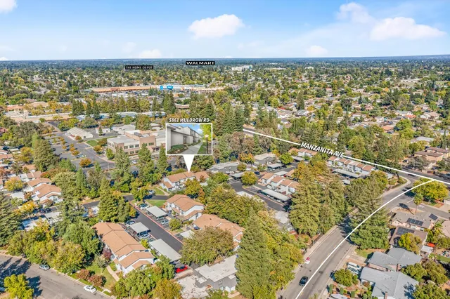 an aerial view of residential house with outdoor space