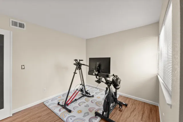 a view of a room with gym equipment