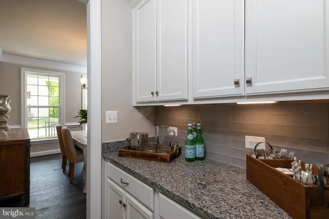 a kitchen with granite countertop lots of counter top space
