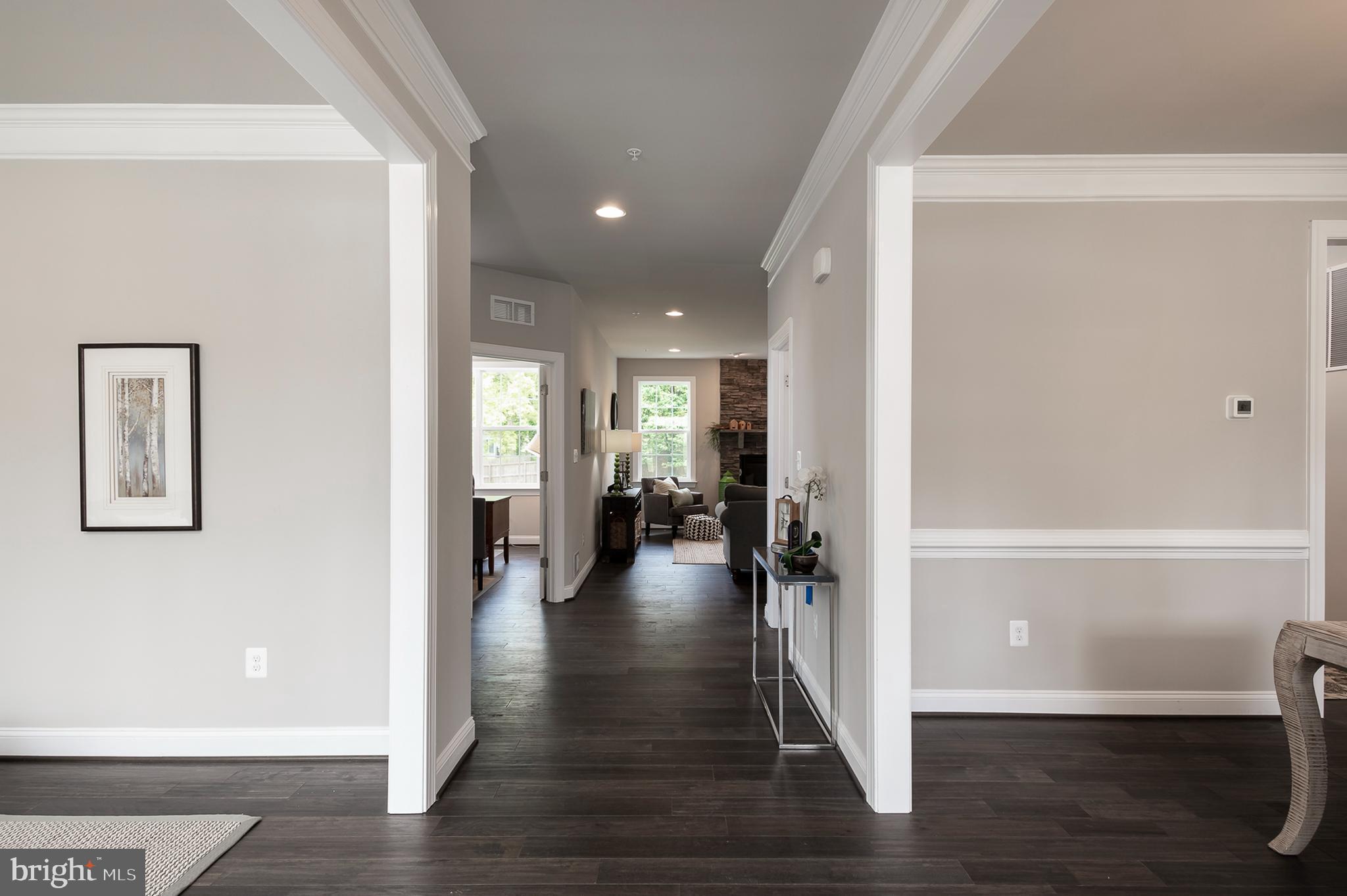 4468 Ilchester Road Ellicott City, MD 21043 - Photo 2 of 32 a view of livingroom with furniture and wooden floor