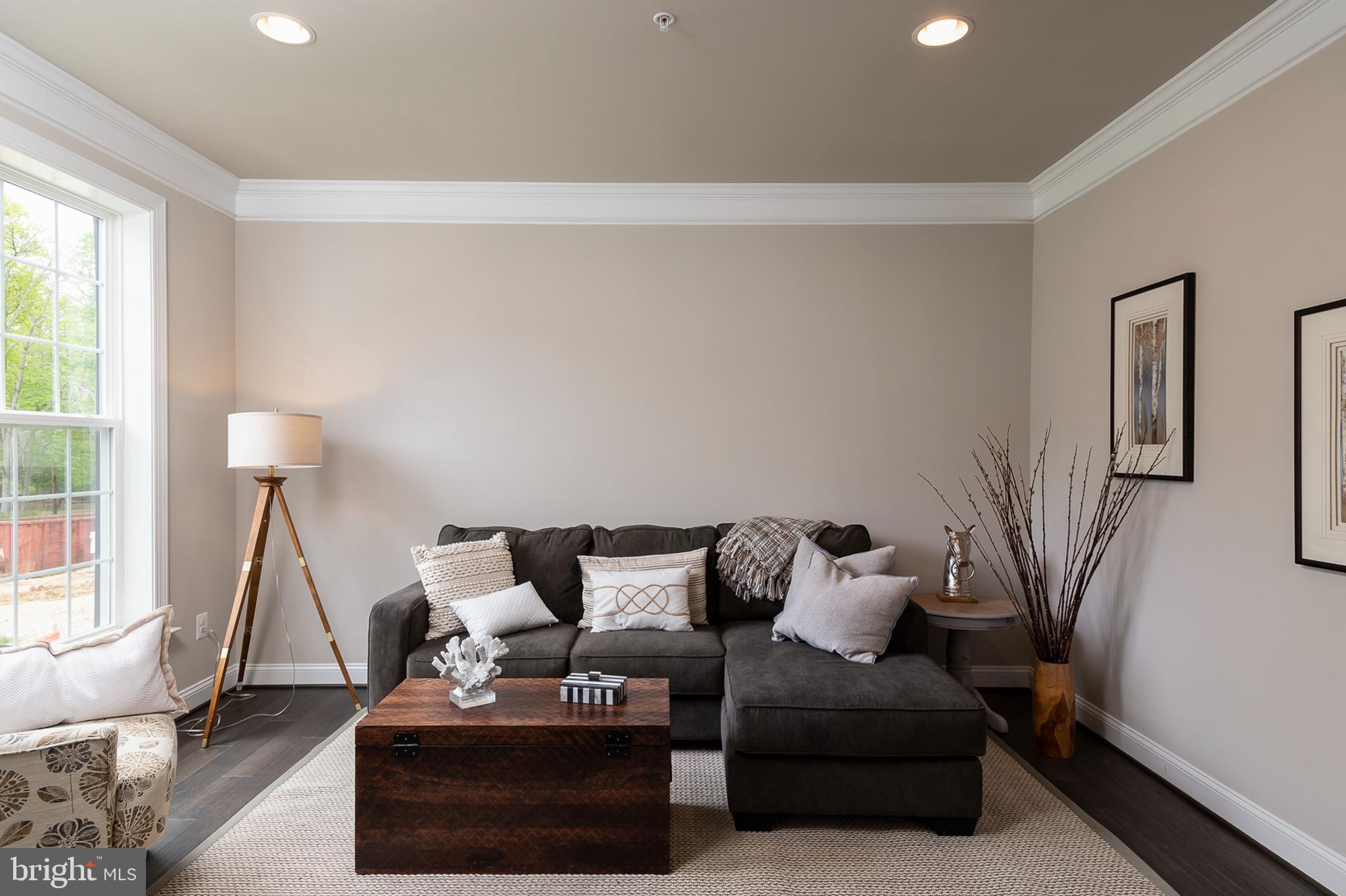 4468 Ilchester Road Ellicott City, MD 21043 - Photo 8 of 32 a living room with furniture and a window