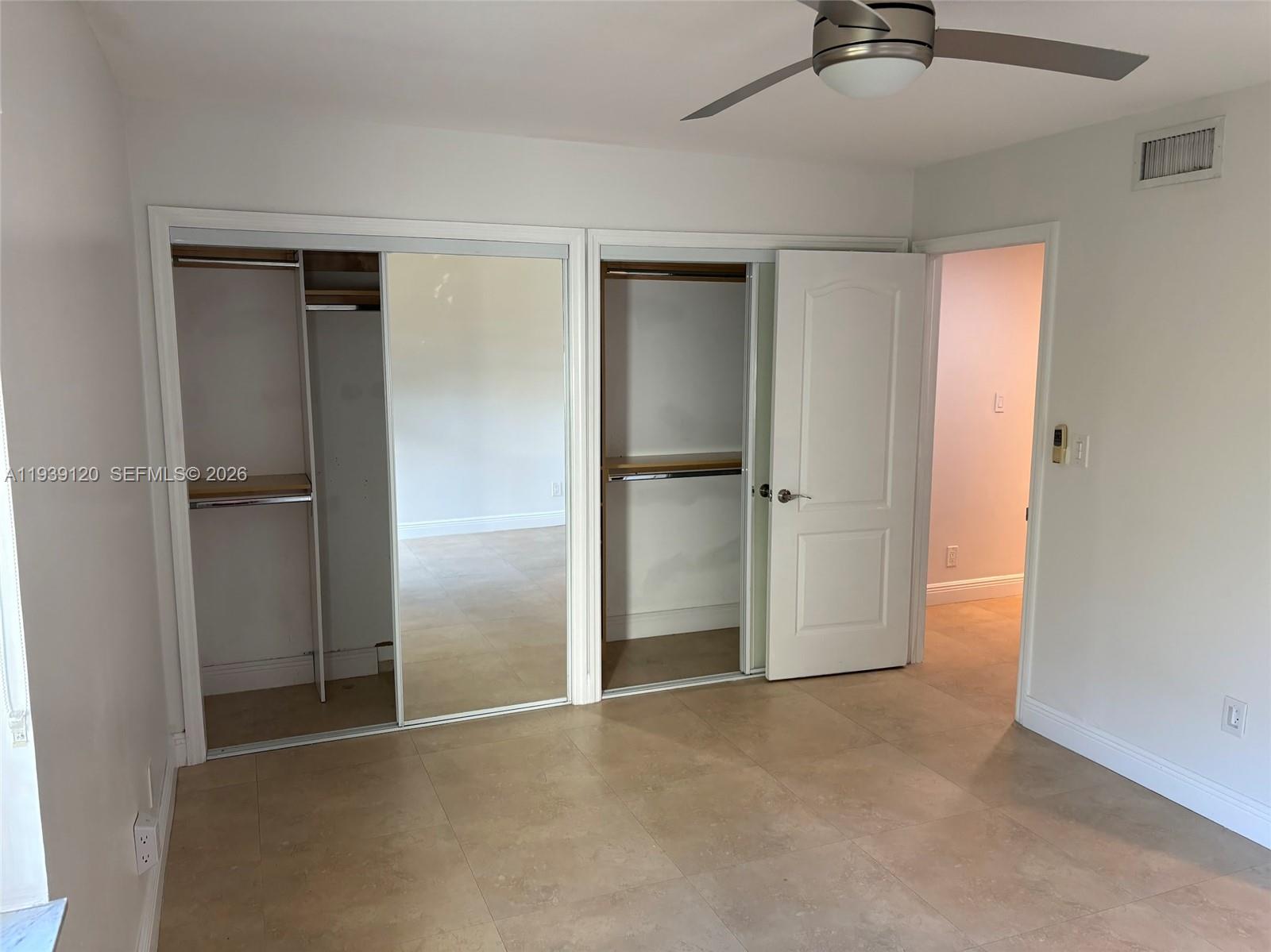 5555 Ludlam Road, Unit 105 South Miami, FL 33155 - Photo 19 of 29 a view of an empty room