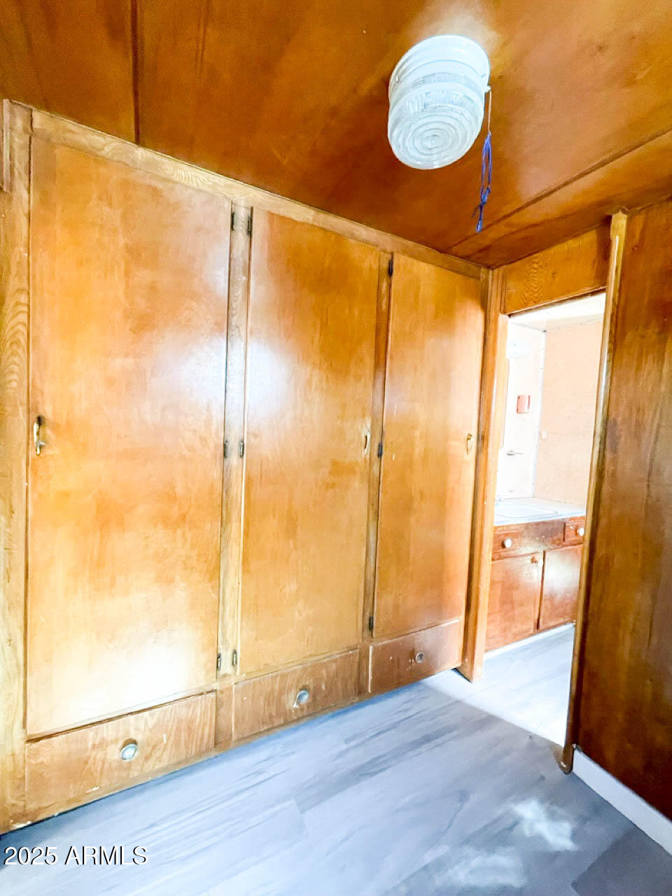 8125 East 5th Avenue Mesa, AZ 85208 - Photo 18 of 46 a view of a bathroom with wooden floor and a shower