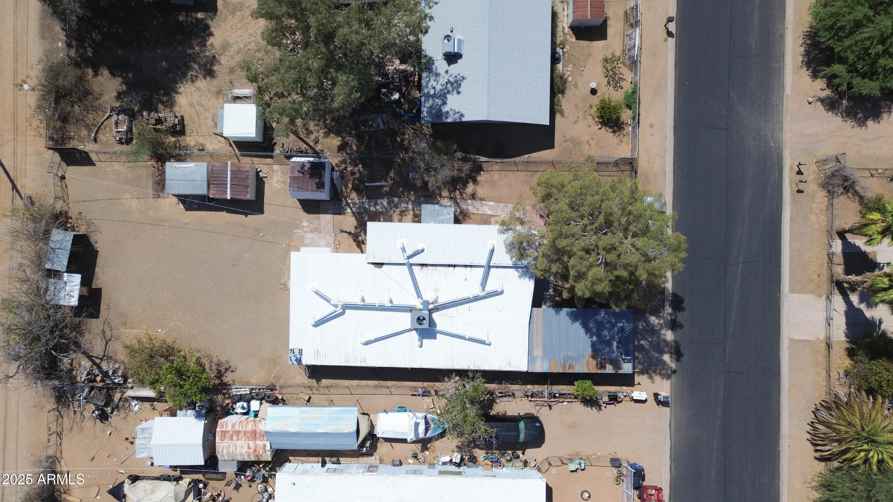 8125 East 5th Avenue Mesa, AZ 85208 - Photo 2 of 46 an aerial view of a houses with yard