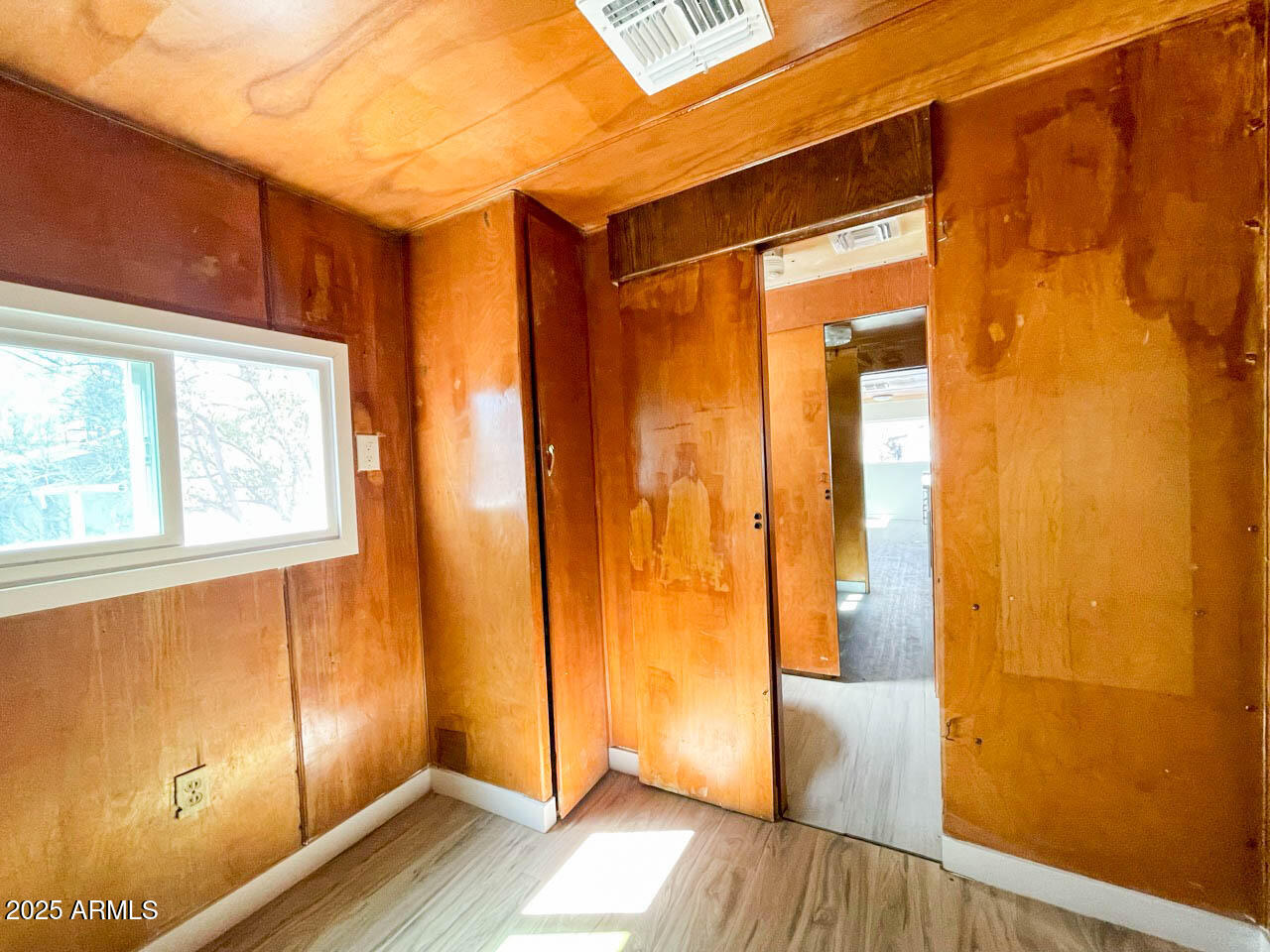 8125 East 5th Avenue Mesa, AZ 85208 - Photo 22 of 46 a view of front door with wooden floor
