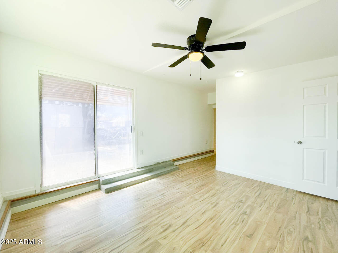 8125 East 5th Avenue Mesa, AZ 85208 - Photo 37 of 46 wooden floor in an empty room