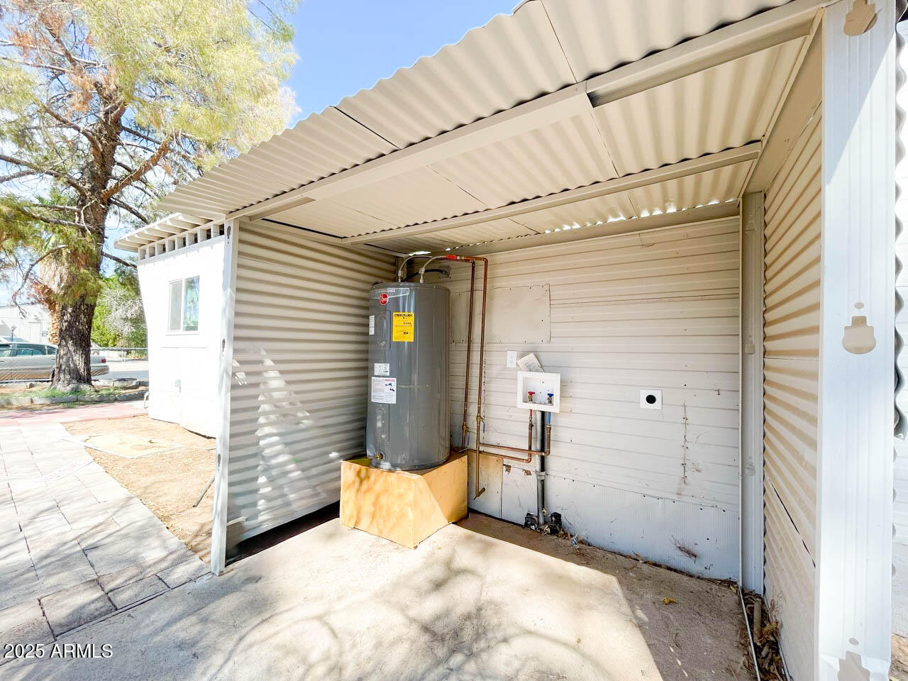 8125 East 5th Avenue Mesa, AZ 85208 - Photo 40 of 46 a bedroom with a bed and a window