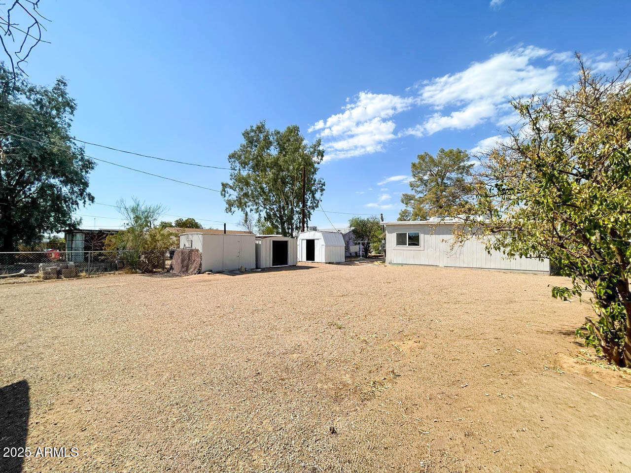 8125 East 5th Avenue Mesa, AZ 85208 - Photo 42 of 46 a street view with large trees