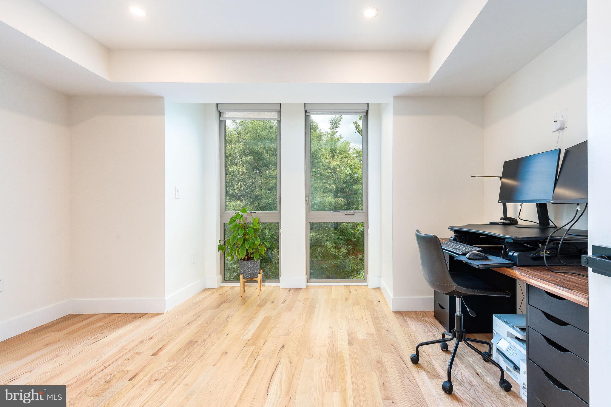 530 Reed Street Philadelphia, PA 19147 - Photo 24 of 57 a view of a workspace with furniture and a window