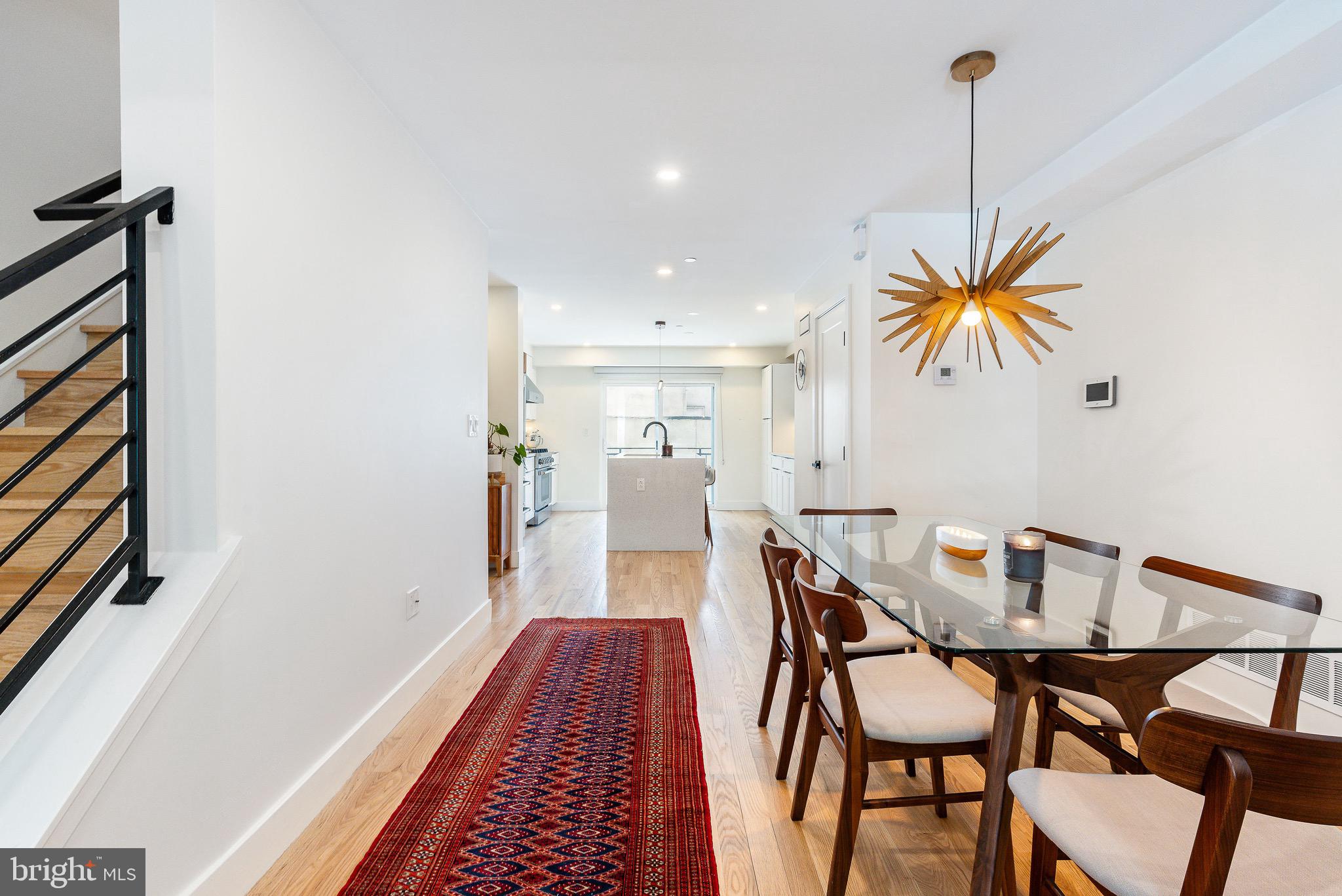 530 Reed Street Philadelphia, PA 19147 - Photo 7 of 57 a dining room with furniture and a rug