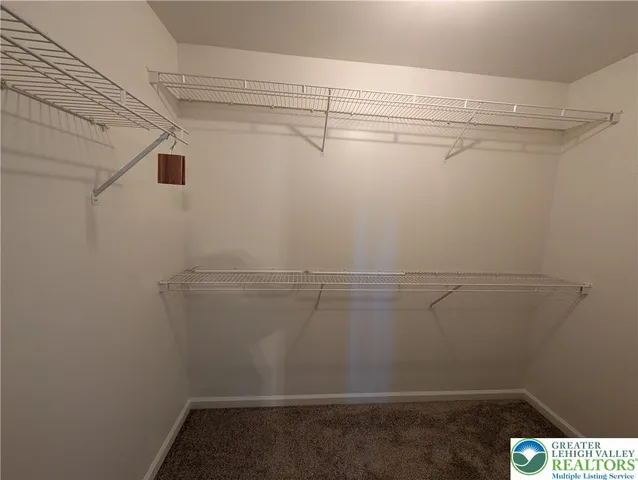 a view of a room with racks on the wall