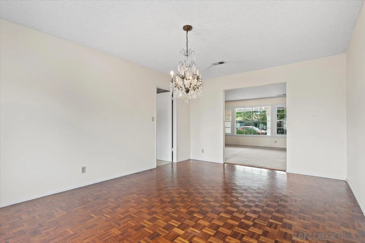 2257 Villa Maria Road North Claremont, CA 91711 - Photo 17 of 44 a view of a chandelier in big room and chandelier fan in a room