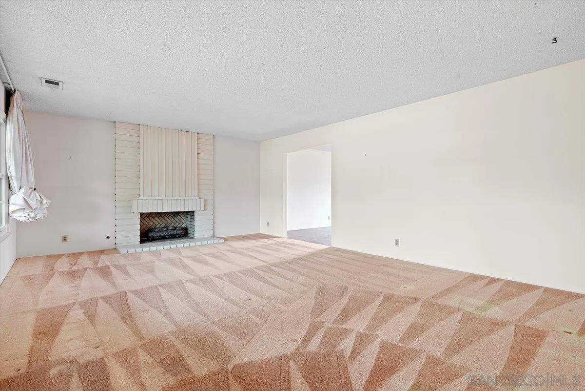 2257 Villa Maria Road North Claremont, CA 91711 - Photo 18 of 44 a view of empty room with fireplace