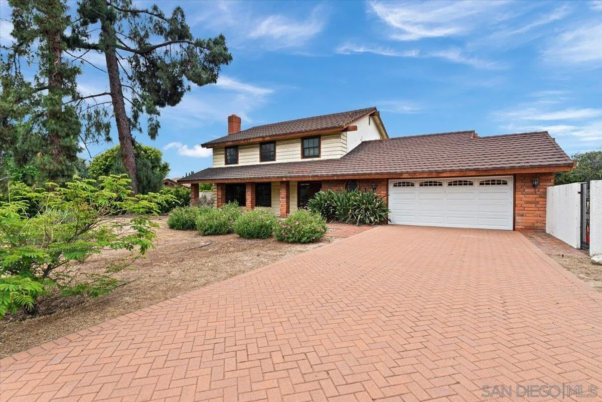2257 Villa Maria Road North Claremont, CA 91711 - Photo 2 of 44 a front view of a house with a yard and garage