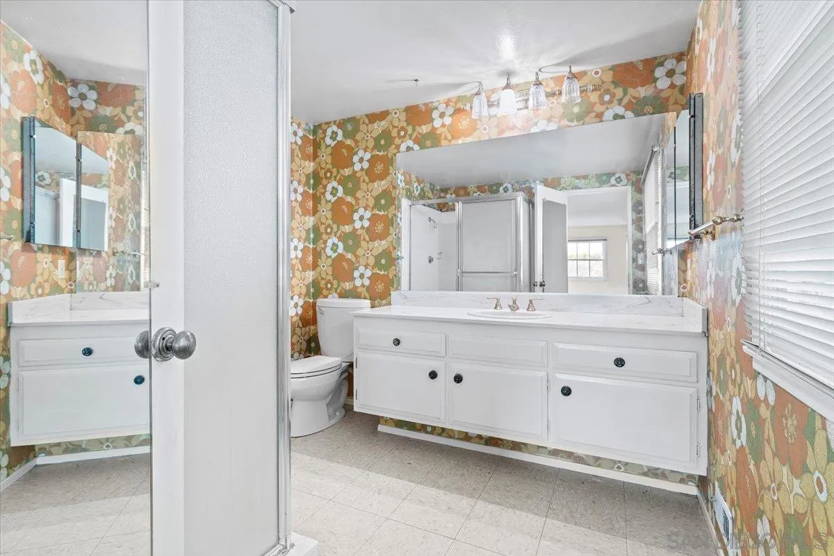 2257 Villa Maria Road North Claremont, CA 91711 - Photo 24 of 44 a bathroom with a double vanity sink mirror and a bathtub