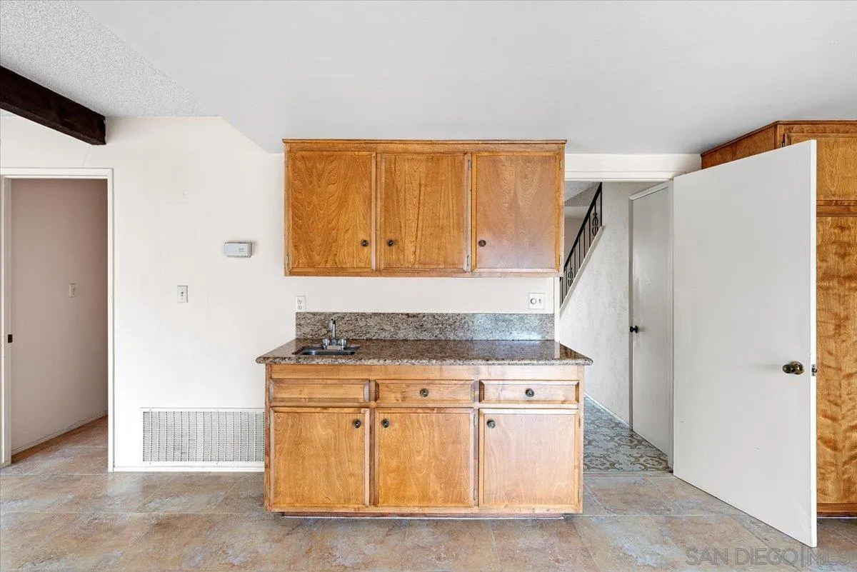 2257 Villa Maria Road North Claremont, CA 91711 - Photo 10 of 44 a stove top oven sitting inside of a kitchen
