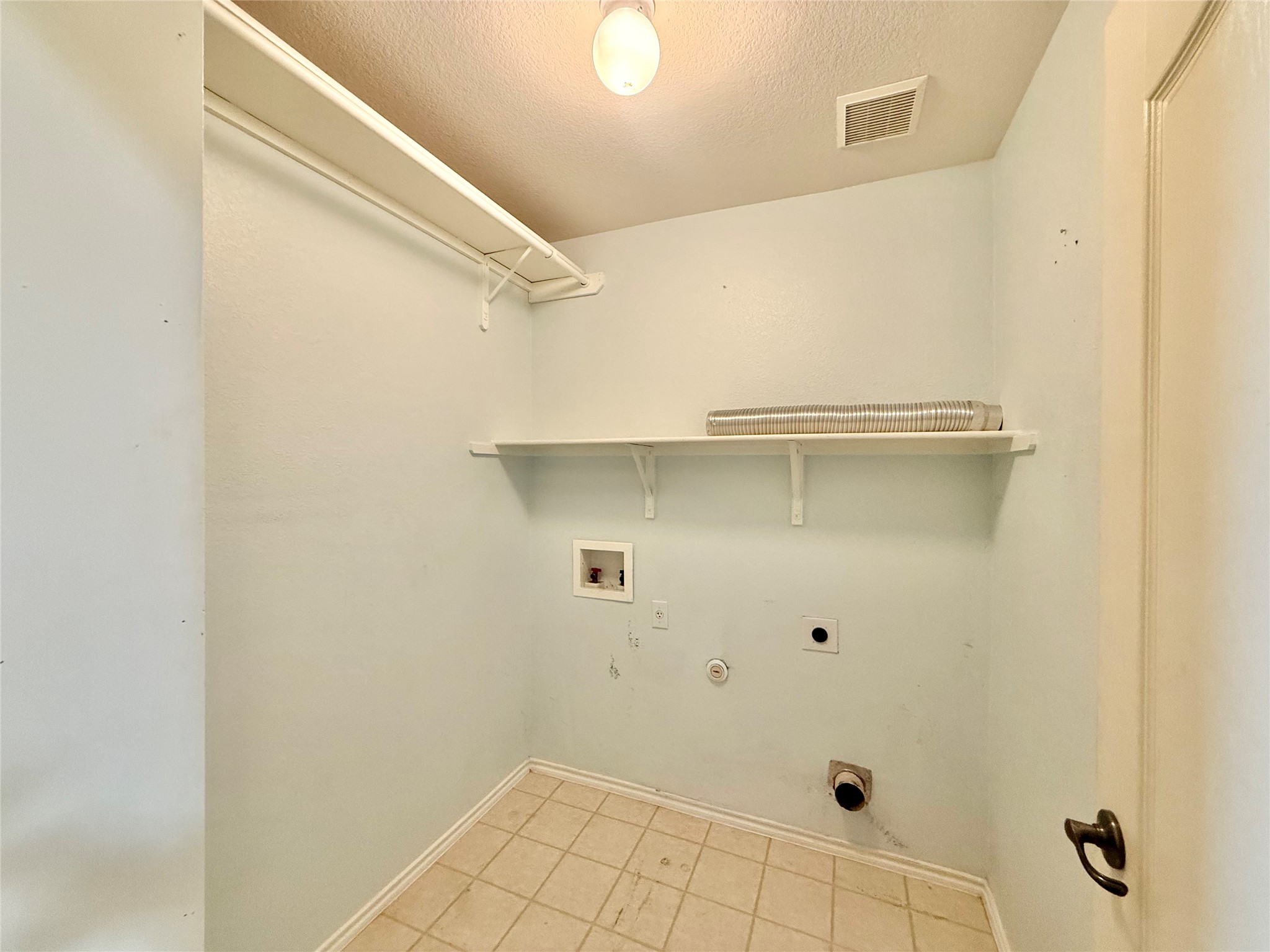 12820 Waynespur Lane Elgin, TX 78621 - Photo 13 of 26 a view of a room with shelf
