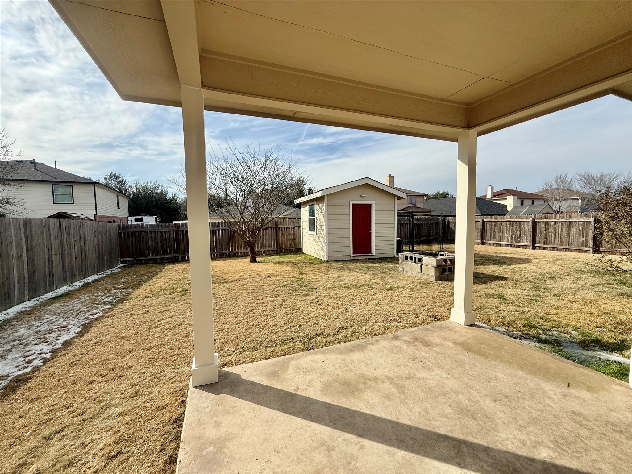 12820 Waynespur Lane Elgin, TX 78621 - Photo 25 of 26 a view of a backyard