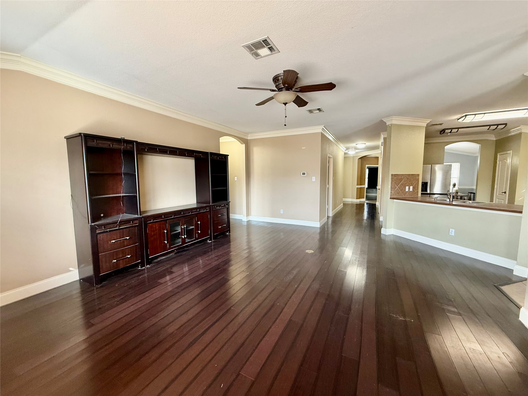 12820 Waynespur Lane Elgin, TX 78621 - Photo 9 of 26 a living room with furniture and a flat screen tv
