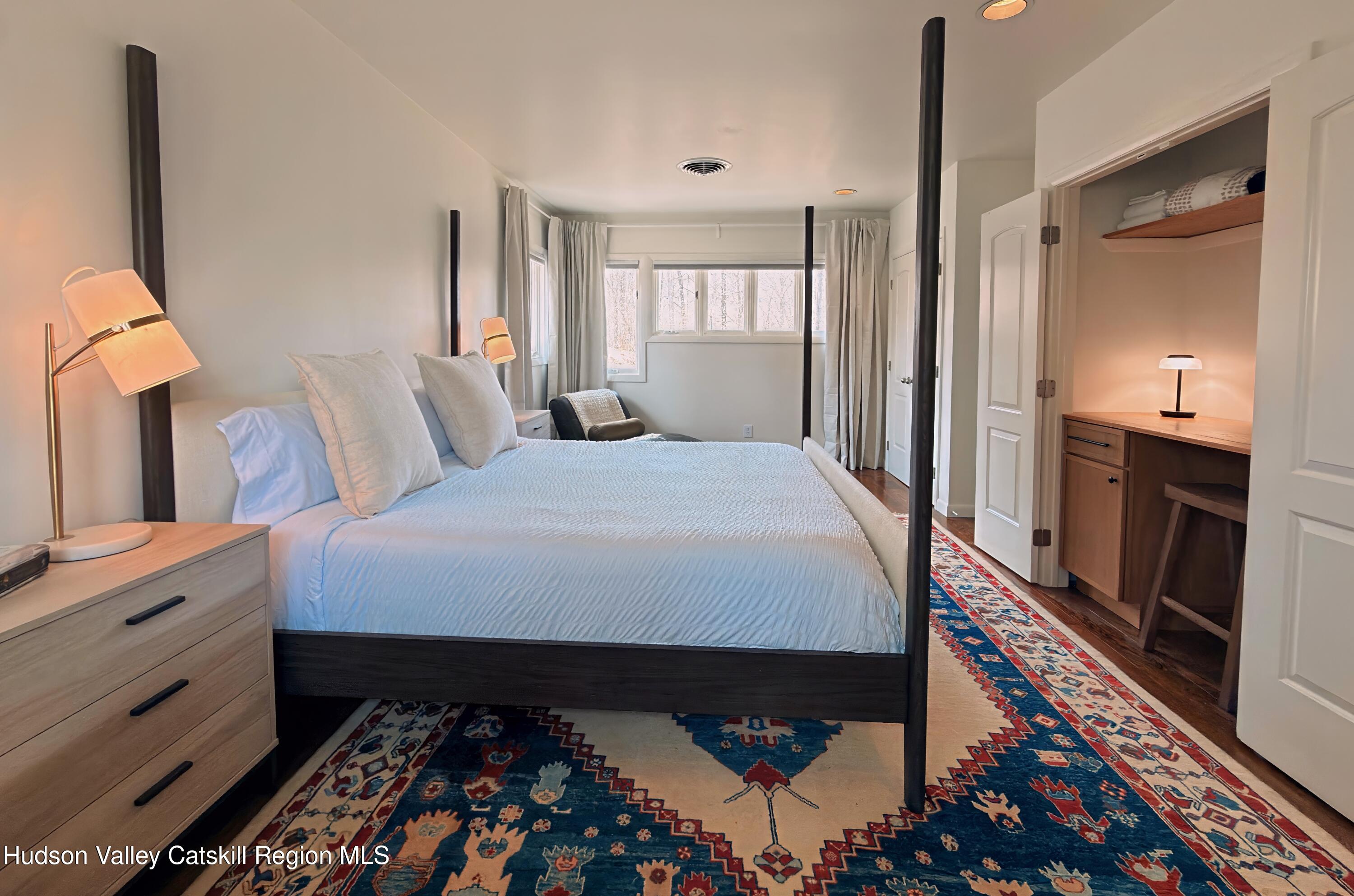 0 Call List Agent Road Amenia, NY 12501 - Photo 12 of 16 a bed room with a bed and a television