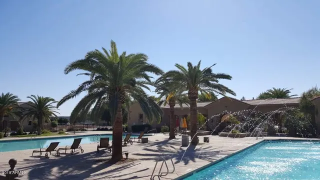a view of a dining room with furniture and window