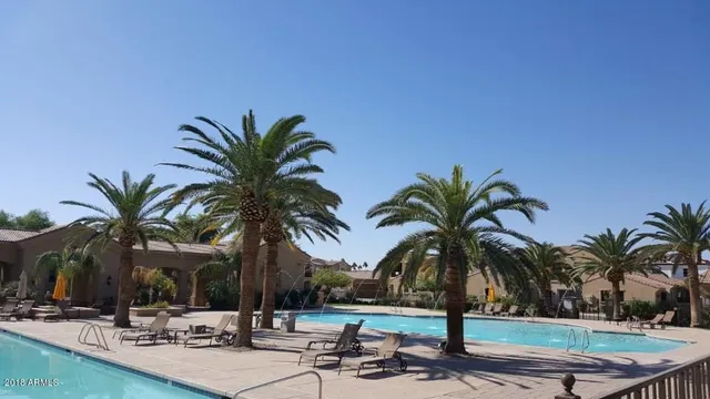 a room with furniture and flat screen tv