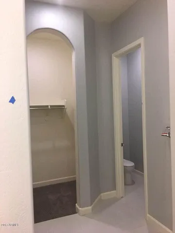 a view of a bathroom with toilet