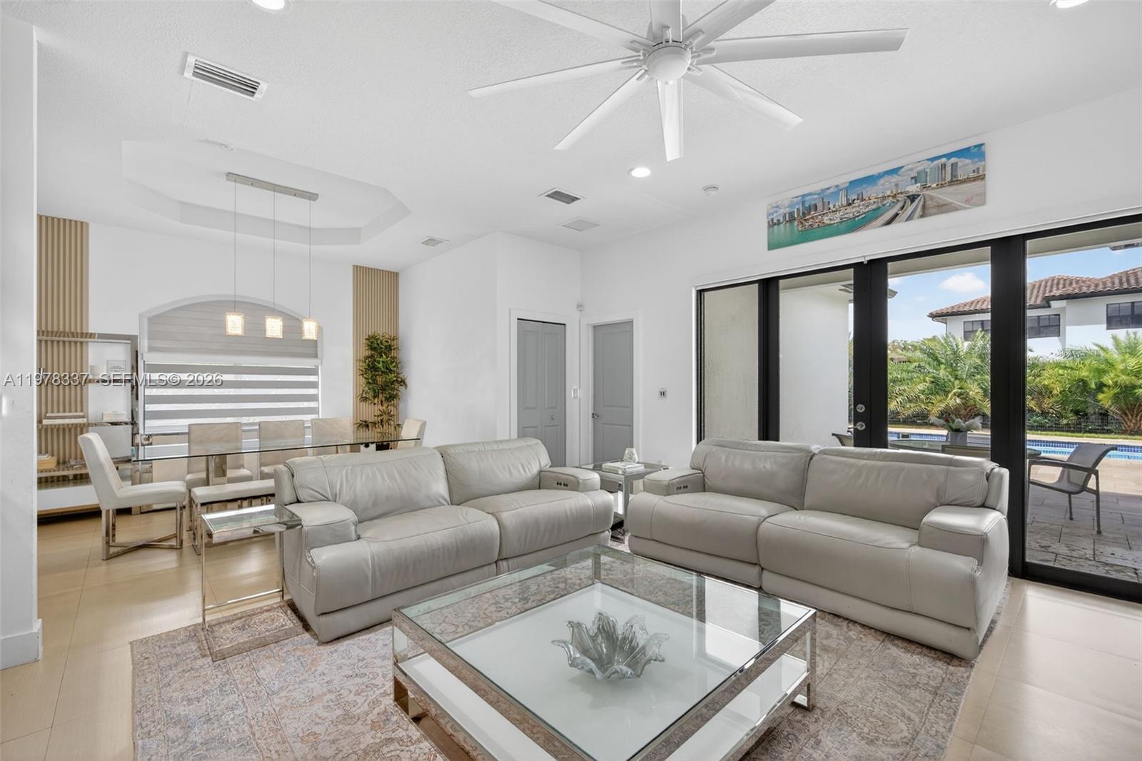 14541 Southwest 16th Street Miami, FL 33184 - Photo 18 of 51 a living room with furniture and a large window