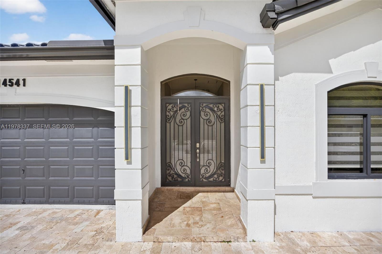 14541 Southwest 16th Street Miami, FL 33184 - Photo 4 of 51 a view of front door of house