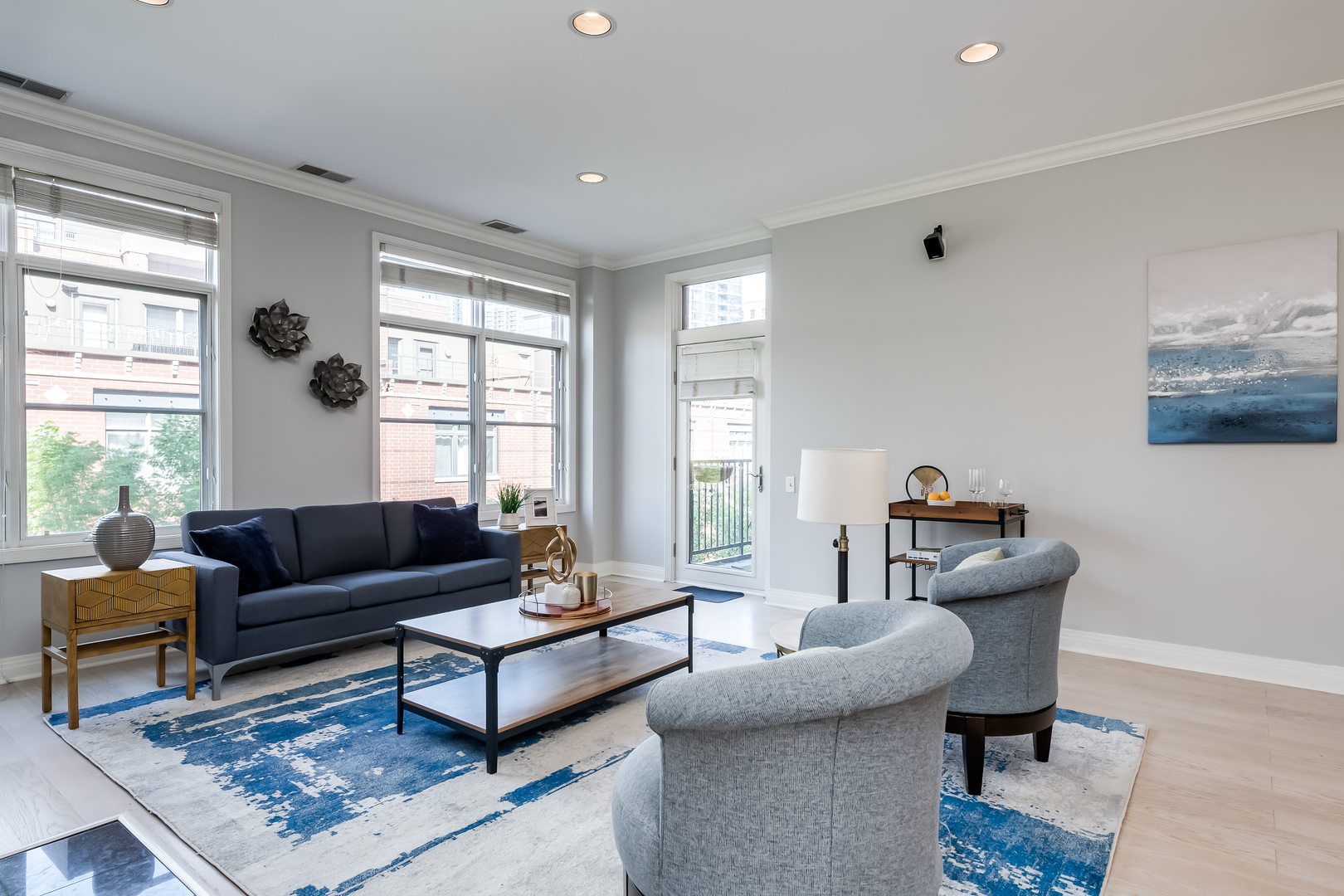 550 West Fulton Street, Unit 301 Chicago, IL 60661 - Photo 4 of 26 a living room with furniture and a large window
