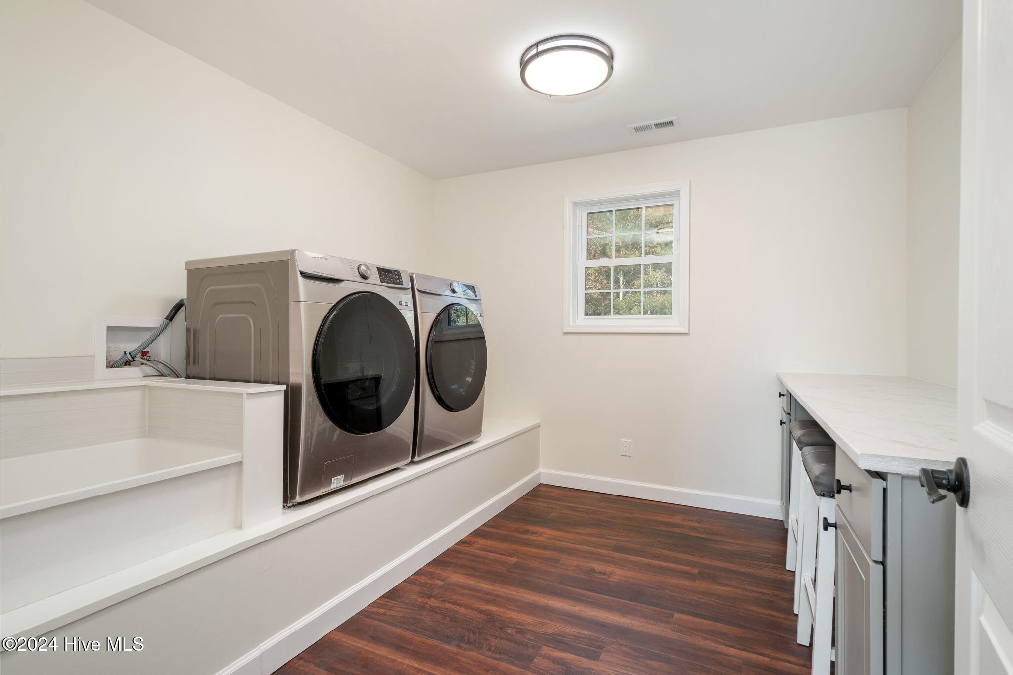 1602 Razorbill Court Morehead City, NC 28557 - Photo 37 of 62 Laundry room w/ dog washing station