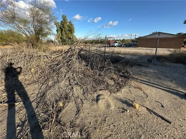 a view of a backyard of the house