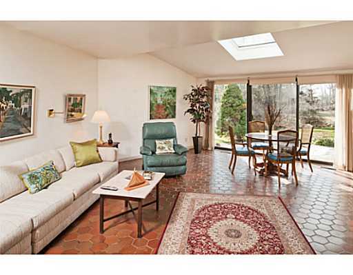 38 Carriglea Drive Riverside, CT 06878 - Photo 5 of 10 a living room with furniture a rug potted plant and a large window