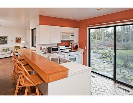 38 Carriglea Drive Riverside, CT 06878 - Photo 6 of 10 a room with furniture a large window and a view of kitchen
