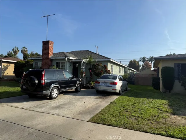 a car parked in front of a house