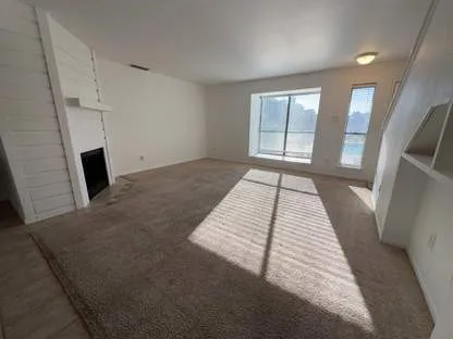 a view of a livingroom with a fireplace