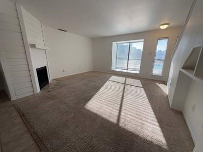 1919 Place Rebecca Lane, Unit H11 Houston, TX 77090 - Photo 4 of 18 a view of a livingroom with a fireplace