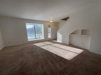 1919 Place Rebecca Lane, Unit H11 Houston, TX 77090 - Photo 5 of 18 a view of empty room with windows