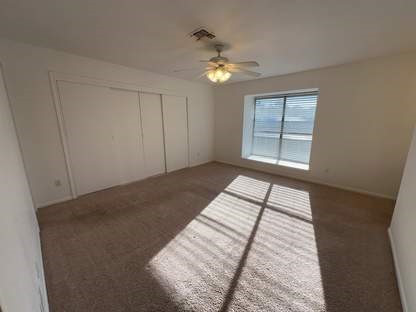 1919 Place Rebecca Lane, Unit H11 Houston, TX 77090 - Photo 10 of 18 a view of an empty room with a window