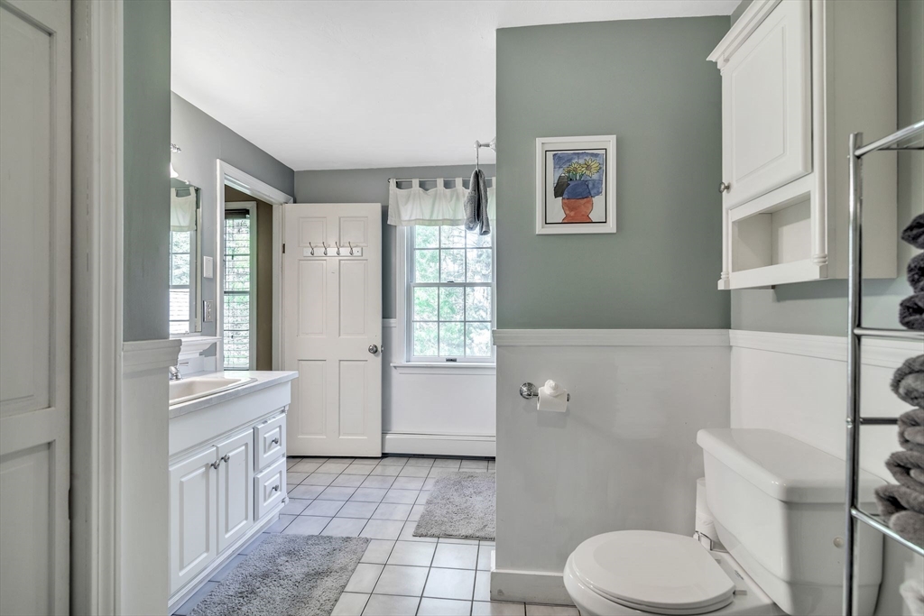 4 Stuart Road Rochester, MA 02770 - Photo 13 of 37 a bathroom with a sink a toilet and shower
